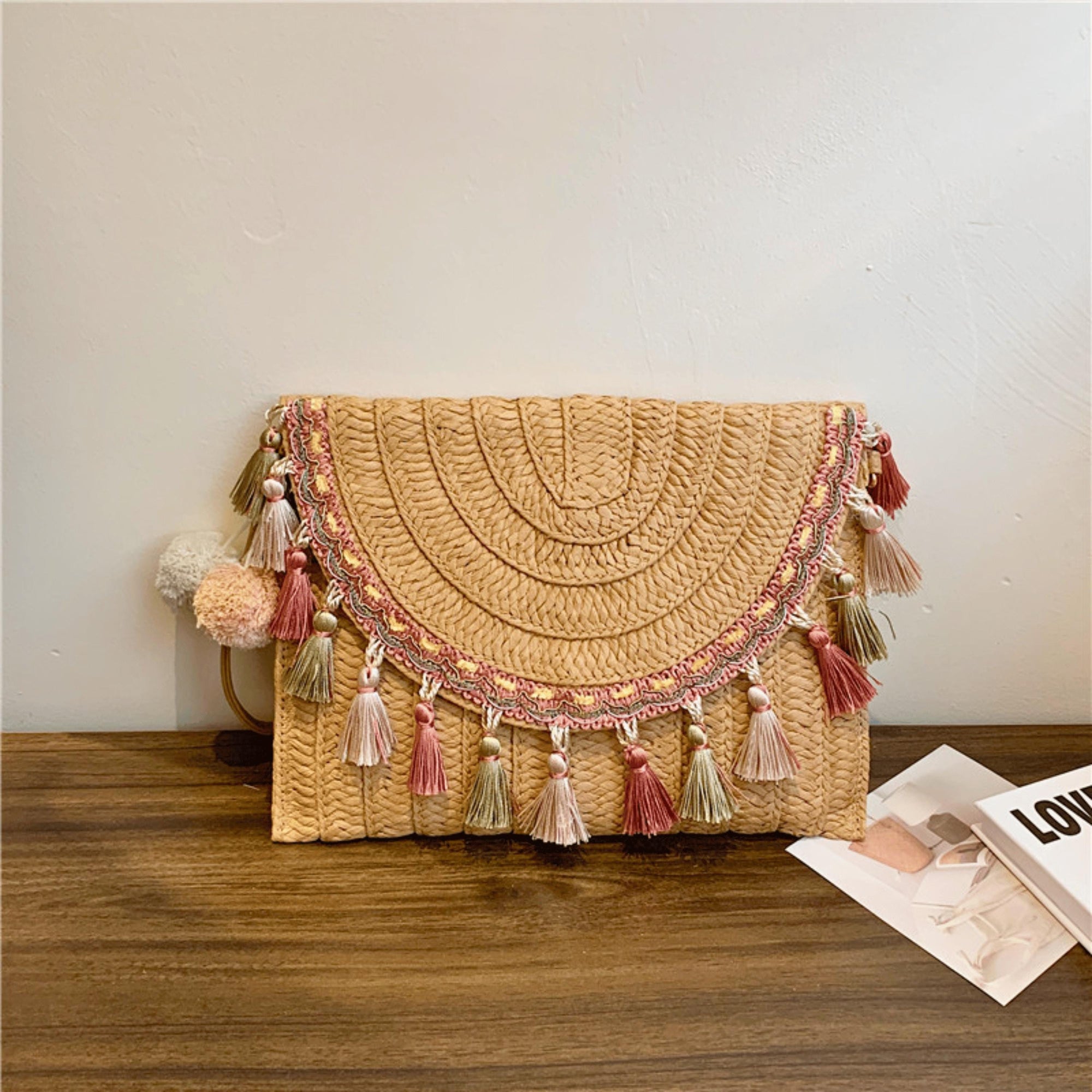 Summer-ready straw purse with colorful tassels and durable woven design