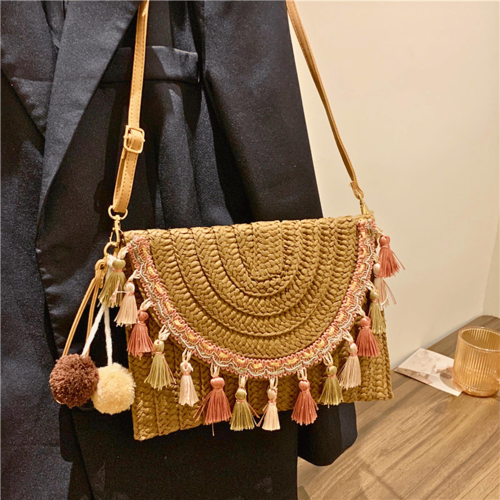 Khaki and coffee color woven straw bag with adjustable strap for casual looks